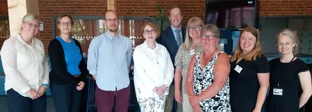 Ledamöterna i det nationella expertrådet för klimatanpassning, inklusive sekretariatet, står tillsammans i grupp.