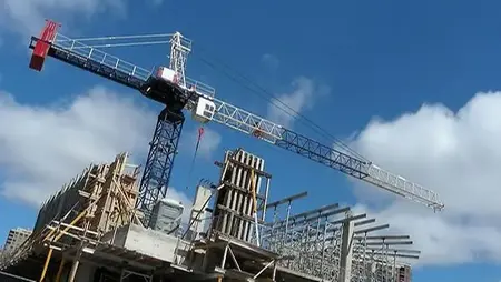 Byggkran vid husbygge.